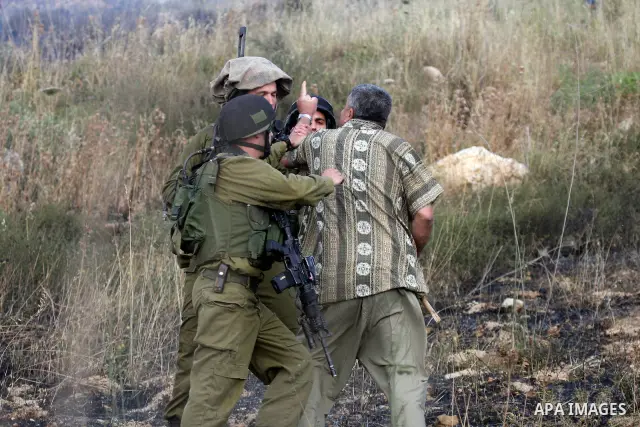 Palestinian man scuffles with Israeli Soldiers during clashes between Palestinians from the village of Asira al-Qibiliya and Israeli settlers from the Jewish settlement of Yitzhar, south of the northern West Bank city of...