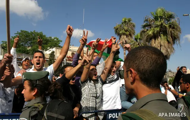 Israeli police Prevented Palestinian demonstrators as they try to disperse a protest against a parade marking Jerusalem Day, in front of Damascus Gate outside Jerusalem's Old City May 20, 2012. Jerusalem Day marks the an...