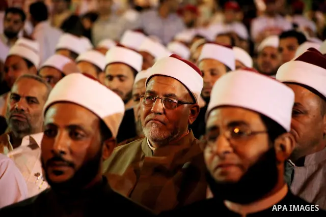 Supporters of the Muslim Brotherhood's presidential candidate Mohammed Mursi, unseen, hold a rally Cairo, Egypt, Sunday, May 20, 2012. Egypt's election commission is vowing that next week's presidential election will be...
