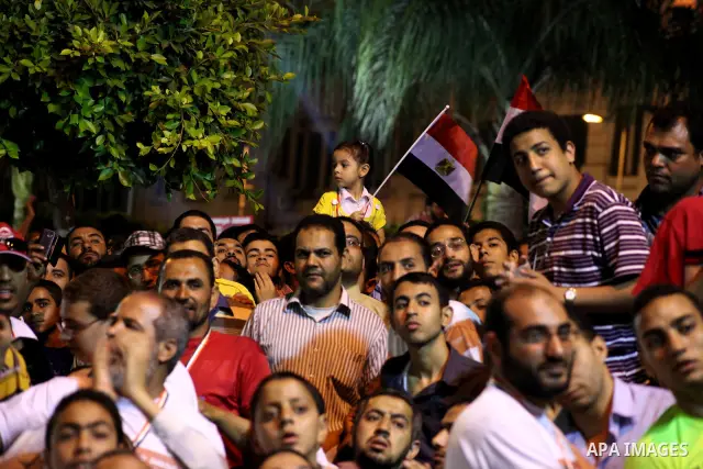 Supporters of the Muslim Brotherhood's presidential candidate Mohammed Mursi, unseen, hold a rally Cairo, Egypt, Sunday, May 20, 2012. Egypt's election commission is vowing that next week's presidential election will be...