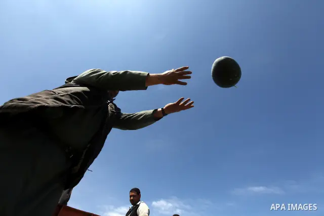 Palestinian farmers collect a watermelon crop from their fields in the city of Rafah, Southern Gaza Strip, 21 May 2012. Rafah, a city bordering Israel, is one of the largest agricultural areas in the Gaza Strip. Photo by...