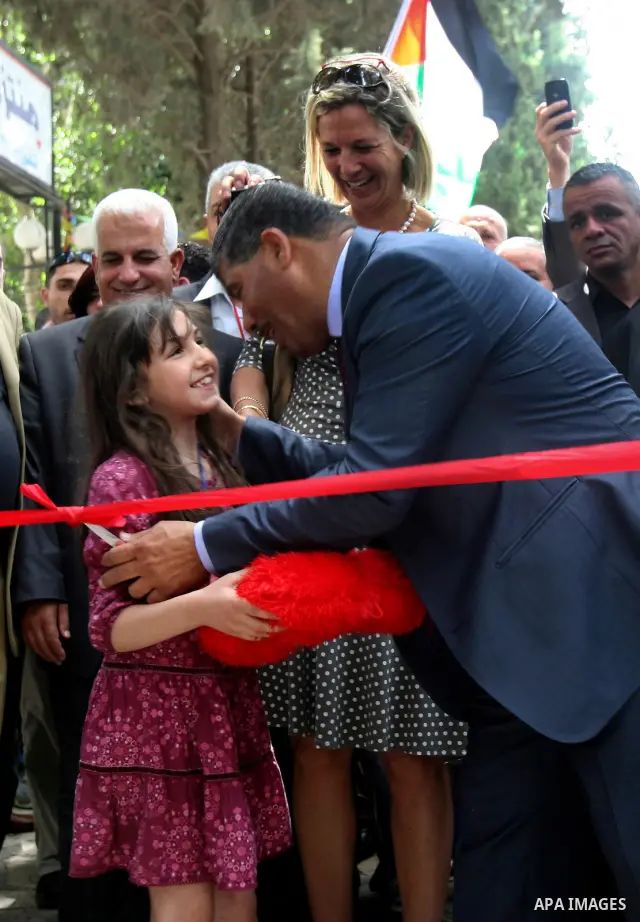 Palestinian Agriculture Minister with Representative of the Netherlands to the Palestinian National Authority, participate in the opening of Palestinian agricultural festival at strawberry and roses , in the West Bank ci...