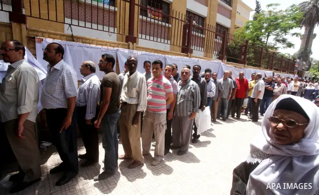 Egyptians wait to vote during second day of the first round of Egypt's presidential elections in Cairo, Egypt, 24 May 2012. Media reports quoting state-television and observers said that far less Egyptians turned out to...
