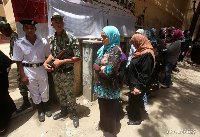 Egyptians wait to vote during second day of the first round of Egypt's presidential elections in Cairo, Egypt, 24 May 2012. Media reports quoting state-television and observers said that far less Egyptians turned out to...