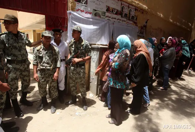 Egyptians wait to vote during second day of the first round of Egypt's presidential elections in Cairo, Egypt, 24 May 2012. Media reports quoting state-television and observers said that far less Egyptians turned out to...