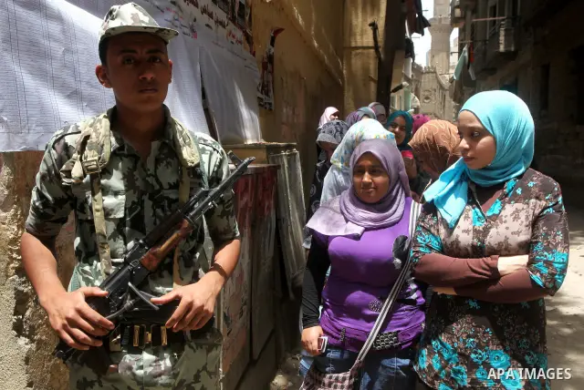 Egyptians wait to vote during second day of the first round of Egypt's presidential elections in Cairo, Egypt, 24 May 2012. Media reports quoting state-television and observers said that far less Egyptians turned out to...