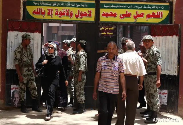 Egyptians wait to vote during second day of the first round of Egypt's presidential elections in Cairo, Egypt, 24 May 2012. Media reports quoting state-television and observers said that far less Egyptians turned out to...