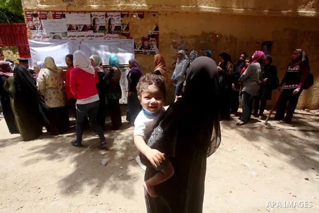 Egyptians wait to vote during second day of the first round of Egypt's presidential elections in Cairo, Egypt, 24 May 2012. Media reports quoting state-television and observers said that far less Egyptians turned out to...