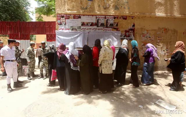 Egyptians wait to vote during second day of the first round of Egypt's presidential elections in Cairo, Egypt, 24 May 2012. Media reports quoting state-television and observers said that far less Egyptians turned out to...