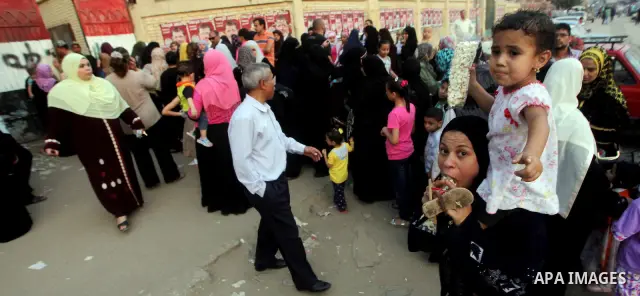 Voters wait outside a polling station in Cairo during presidential elections May 24, 2012. Egypt resumes its first free presidential election on Thursday after voting passed off mostly calmly on the first day apart from...