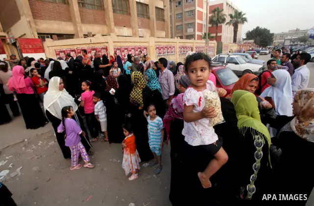 Voters wait outside a polling station in Cairo during presidential elections May 24, 2012. Egypt resumes its first free presidential election on Thursday after voting passed off mostly calmly on the first day apart from...