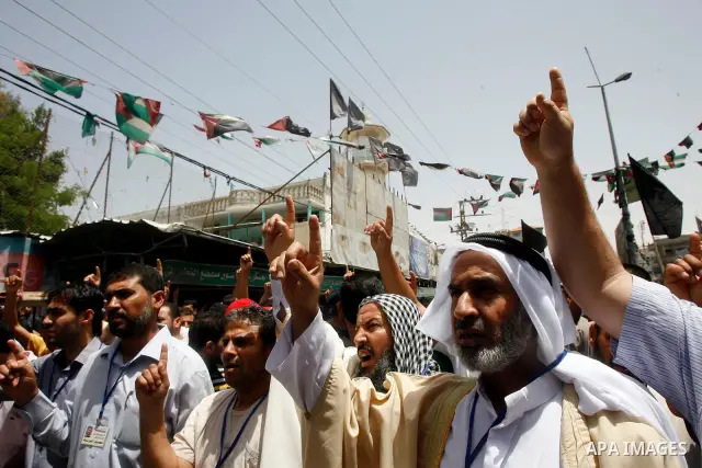Palestinian Islamic Jihad members take part in a demonstration following friday prayers in solidarity with prisoners jailed in Israel after days from signing of a deal to end the prisoner's hunger strike, in Rafah refuge...