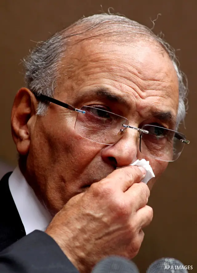 Egyptian presidential candidate Ahmed Shafiq speaks to the media during a press conference at his office in Cairo, Egypt, Saturday, May 26, 2012. Egyptian presidential candidate Ahmed Shafiq paid tribute Saturday to the...