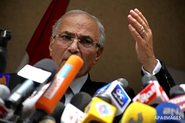 Egyptian presidential candidate Ahmed Shafiq speaks to the media during a press conference at his office in Cairo, Egypt, Saturday, May 26, 2012. Egyptian presidential candidate Ahmed Shafiq paid tribute Saturday to the...