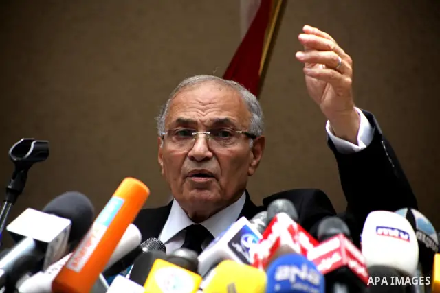 Egyptian presidential candidate Ahmed Shafiq speaks to the media during a press conference at his office in Cairo, Egypt, Saturday, May 26, 2012. Egyptian presidential candidate Ahmed Shafiq paid tribute Saturday to the...