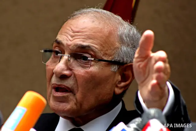 Egyptian presidential candidate Ahmed Shafiq speaks to the media during a press conference at his office in Cairo, Egypt, Saturday, May 26, 2012. Egyptian presidential candidate Ahmed Shafiq paid tribute Saturday to the...