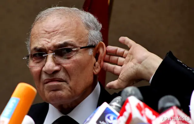 Egyptian presidential candidate Ahmed Shafiq speaks to the media during a press conference at his office in Cairo, Egypt, Saturday, May 26, 2012. Egyptian presidential candidate Ahmed Shafiq paid tribute Saturday to the...