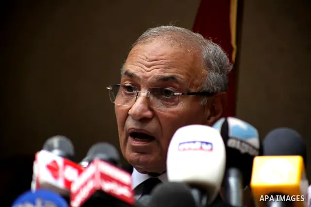 Egyptian presidential candidate Ahmed Shafiq speaks to the media during a press conference at his office in Cairo, Egypt, Saturday, May 26, 2012. Egyptian presidential candidate Ahmed Shafiq paid tribute Saturday to the...