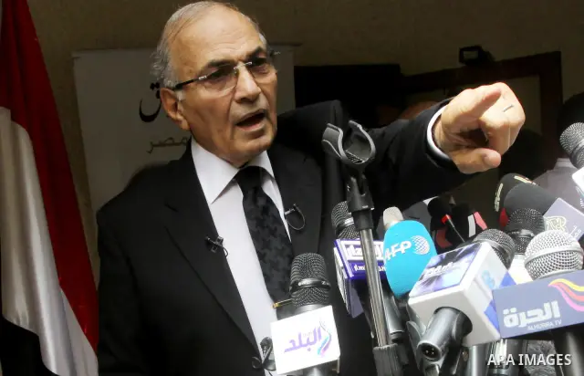 Egyptian presidential candidate Ahmed Shafiq speaks to the media during a press conference at his office in Cairo, Egypt, Saturday, May 26, 2012. Egyptian presidential candidate Ahmed Shafiq paid tribute Saturday to the...