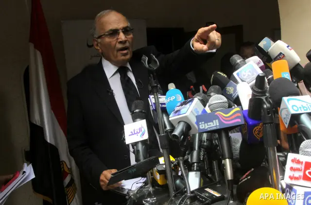 Egyptian presidential candidate Ahmed Shafiq speaks to the media during a press conference at his office in Cairo, Egypt, Saturday, May 26, 2012. Egyptian presidential candidate Ahmed Shafiq paid tribute Saturday to the...
