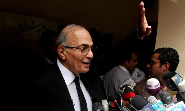 Egyptian presidential candidate Ahmed Shafiq speaks to the media during a press conference at his office in Cairo, Egypt, Saturday, May 26, 2012. Egyptian presidential candidate Ahmed Shafiq paid tribute Saturday to the...