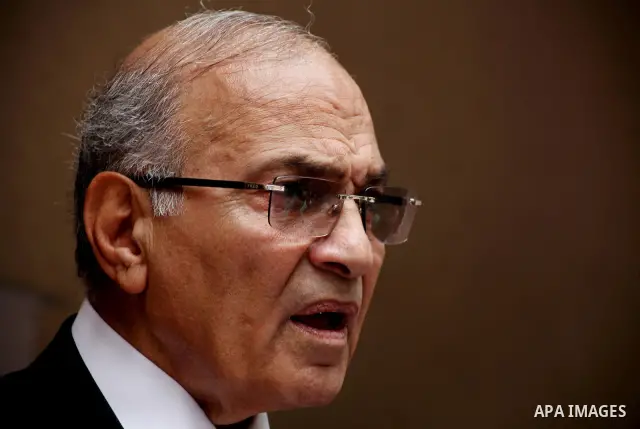 Egyptian presidential candidate Ahmed Shafiq speaks to the media during a press conference at his office in Cairo, Egypt, Saturday, May 26, 2012. Egyptian presidential candidate Ahmed Shafiq paid tribute Saturday to the...