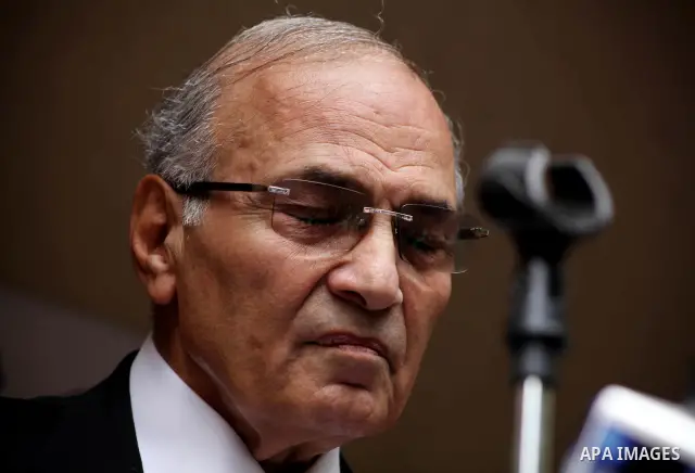 Egyptian presidential candidate Ahmed Shafiq speaks to the media during a press conference at his office in Cairo, Egypt, Saturday, May 26, 2012. Egyptian presidential candidate Ahmed Shafiq paid tribute Saturday to the...