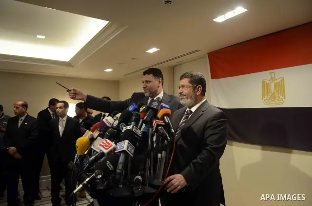 Muslim Brotherhood Egyptian presidential candidate Mohammed Mursi gives a press conference in Cairo on May 26, 2012. The Muslim Brotherhood today urged Egyptians to rally behind their presidential candidate in an almost...