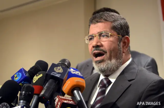 Muslim Brotherhood Egyptian presidential candidate Mohammed Mursi gives a press conference in Cairo on May 26, 2012. The Muslim Brotherhood today urged Egyptians to rally behind their presidential candidate in an almost...