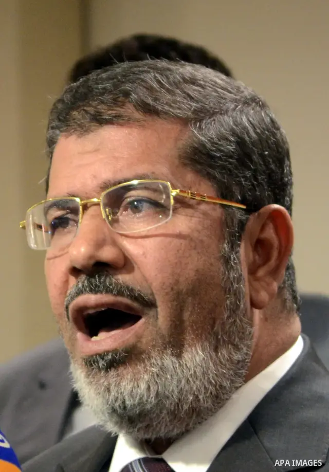 Muslim Brotherhood Egyptian presidential candidate Mohammed Mursi gives a press conference in Cairo on May 26, 2012. The Muslim Brotherhood today urged Egyptians to rally behind their presidential candidate in an almost...