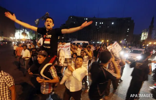 Egyptian protesters shout slogans during a protest against candidate Ahmed Shafiq and support candidate Hamdeen Sabahi, at Tahrir Square in Cairo May 27, 2012. The prospect of Shafiq succeeding Hosni Mubarak as president...