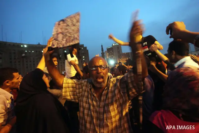 Egyptian protesters shout slogans during a protest against candidate Ahmed Shafiq and support candidate Hamdeen Sabahi, at Tahrir Square in Cairo May 27, 2012. The prospect of Shafiq succeeding Hosni Mubarak as president...