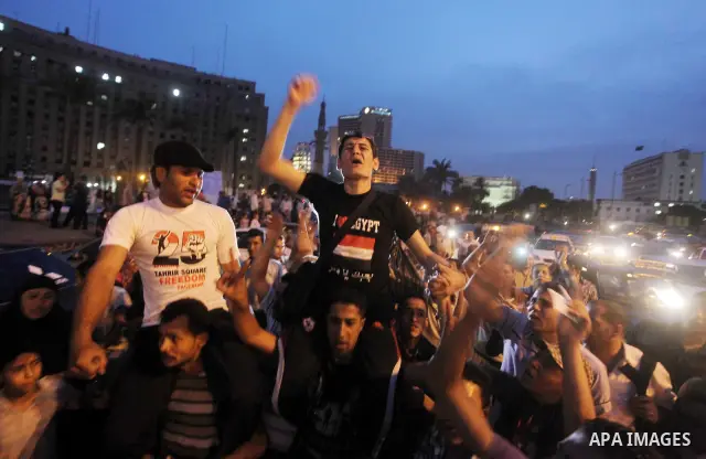 Egyptian protesters shout slogans during a protest against candidate Ahmed Shafiq and support candidate Hamdeen Sabahi, at Tahrir Square in Cairo May 27, 2012. The prospect of Shafiq succeeding Hosni Mubarak as president...