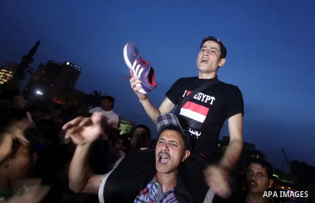Egyptian protesters shout slogans during a protest against candidate Ahmed Shafiq and support candidate Hamdeen Sabahi, at Tahrir Square in Cairo May 27, 2012. The prospect of Shafiq succeeding Hosni Mubarak as president...