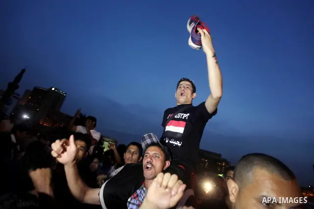 Egyptian protesters shout slogans during a protest against candidate Ahmed Shafiq and support candidate Hamdeen Sabahi, at Tahrir Square in Cairo May 27, 2012. The prospect of Shafiq succeeding Hosni Mubarak as president...