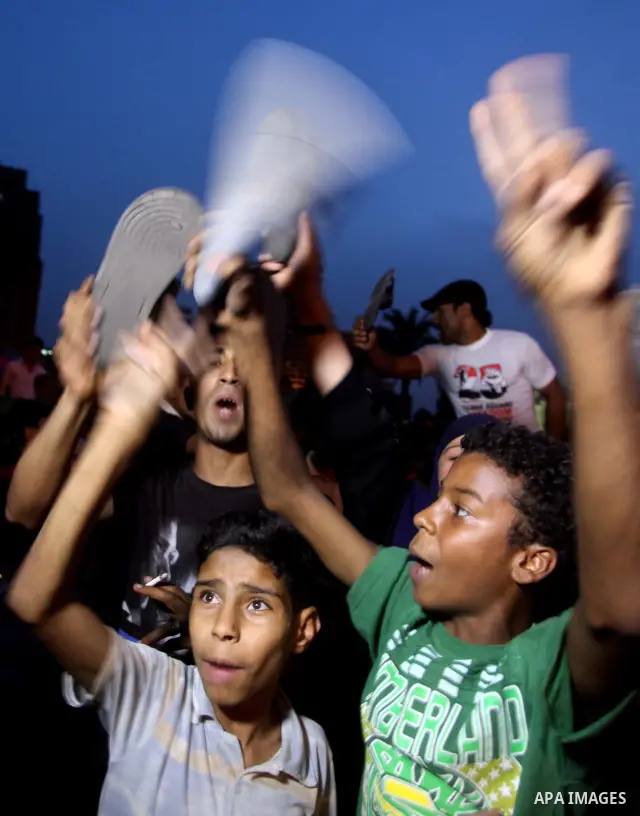 Egyptian protesters shout slogans during a protest against candidate Ahmed Shafiq and support candidate Hamdeen Sabahi, at Tahrir Square in Cairo May 27, 2012. The prospect of Shafiq succeeding Hosni Mubarak as president...