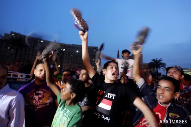 Egyptian protesters shout slogans during a protest against candidate Ahmed Shafiq and support candidate Hamdeen Sabahi, at Tahrir Square in Cairo May 27, 2012. The prospect of Shafiq succeeding Hosni Mubarak as president...