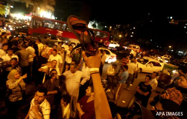 Egyptian protesters shout slogans during a protest against candidate Ahmed Shafiq and support candidate Hamdeen Sabahi, at Tahrir Square in Cairo May 27, 2012. The prospect of Shafiq succeeding Hosni Mubarak as president...