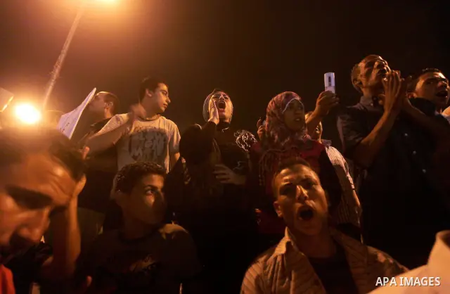 Egyptian protesters shout slogans during a protest against candidate Ahmed Shafiq and support candidate Hamdeen Sabahi, at Tahrir Square in Cairo May 27, 2012. The prospect of Shafiq succeeding Hosni Mubarak as president...