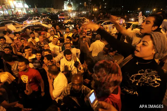 Egyptian protesters shout slogans during a protest against candidate Ahmed Shafiq and support candidate Hamdeen Sabahi, at Tahrir Square in Cairo May 27, 2012. The prospect of Shafiq succeeding Hosni Mubarak as president...