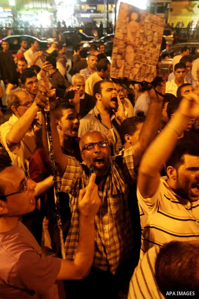 Egyptian protesters shout slogans during a protest against candidate Ahmed Shafiq and support candidate Hamdeen Sabahi, at Tahrir Square in Cairo May 27, 2012. The prospect of Shafiq succeeding Hosni Mubarak as president...
