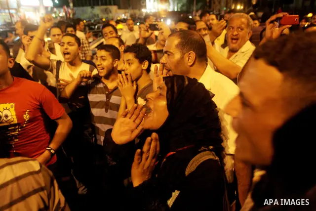 Egyptian protesters shout slogans during a protest against candidate Ahmed Shafiq and support candidate Hamdeen Sabahi, at Tahrir Square in Cairo May 27, 2012. The prospect of Shafiq succeeding Hosni Mubarak as president...