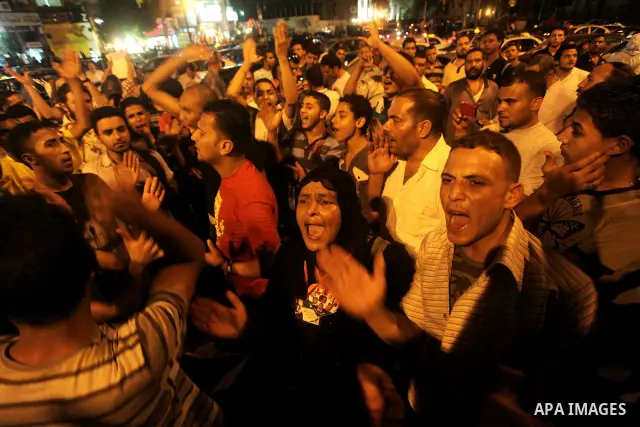 Egyptian protesters shout slogans during a protest against candidate Ahmed Shafiq and support candidate Hamdeen Sabahi, at Tahrir Square in Cairo May 27, 2012. The prospect of Shafiq succeeding Hosni Mubarak as president...