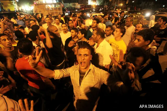 Egyptian protesters shout slogans during a protest against candidate Ahmed Shafiq and support candidate Hamdeen Sabahi, at Tahrir Square in Cairo May 27, 2012. The prospect of Shafiq succeeding Hosni Mubarak as president...