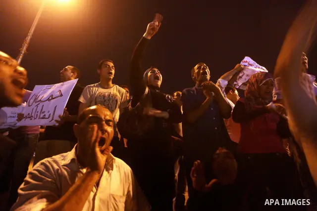 Egyptian protesters shout slogans during a protest against candidate Ahmed Shafiq and support candidate Hamdeen Sabahi, at Tahrir Square in Cairo May 27, 2012. The prospect of Shafiq succeeding Hosni Mubarak as president...