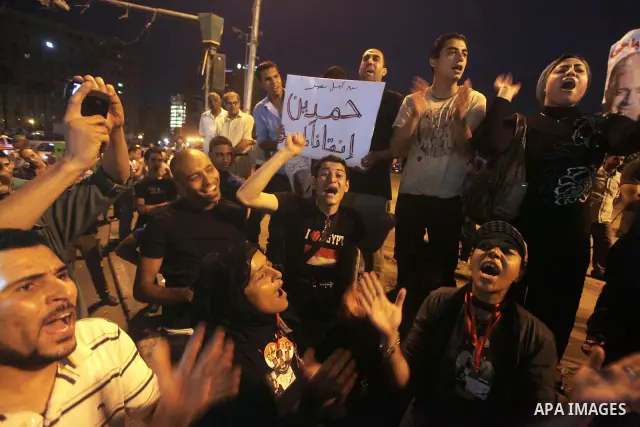 Egyptian protesters shout slogans during a protest against candidate Ahmed Shafiq and support candidate Hamdeen Sabahi, at Tahrir Square in Cairo May 27, 2012. The prospect of Shafiq succeeding Hosni Mubarak as president...