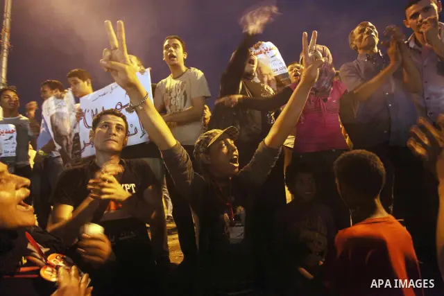Egyptian protesters shout slogans during a protest against candidate Ahmed Shafiq and support candidate Hamdeen Sabahi, at Tahrir Square in Cairo May 27, 2012. The prospect of Shafiq succeeding Hosni Mubarak as president...