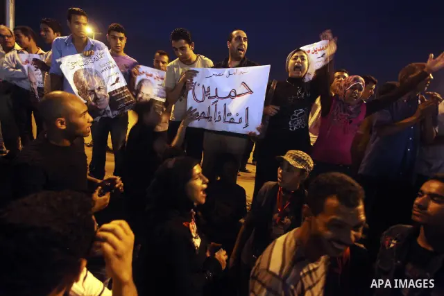 Egyptian protesters shout slogans during a protest against candidate Ahmed Shafiq and support candidate Hamdeen Sabahi, at Tahrir Square in Cairo May 27, 2012. The prospect of Shafiq succeeding Hosni Mubarak as president...