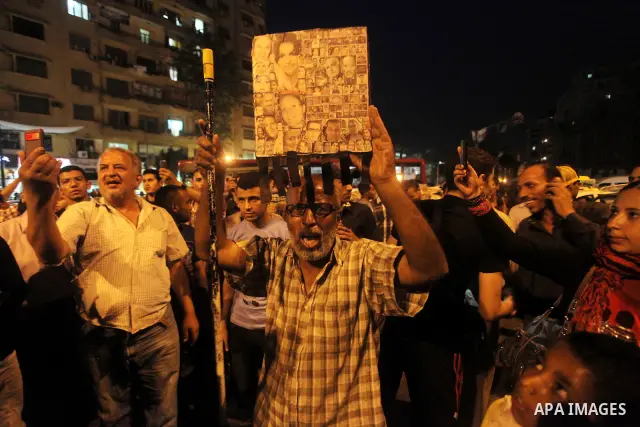 Egyptian protesters shout slogans during a protest against candidate Ahmed Shafiq and support candidate Hamdeen Sabahi, at Tahrir Square in Cairo May 27, 2012. The prospect of Shafiq succeeding Hosni Mubarak as president...