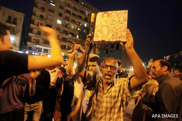 Egyptian protesters shout slogans during a protest against candidate Ahmed Shafiq and support candidate Hamdeen Sabahi, at Tahrir Square in Cairo May 27, 2012. The prospect of Shafiq succeeding Hosni Mubarak as president...